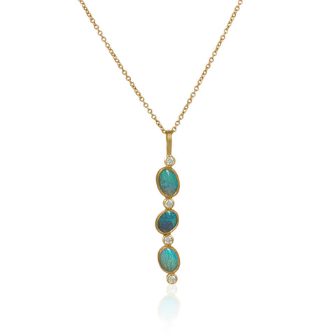 Karin Jacobson jewelry 3 opal and diamond pendant in 18k & 22k gold and sterling silver back, on 18k gold chain. shown on white