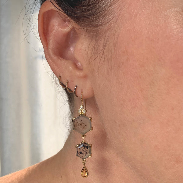 Montana agate hexagon earrings with pear shaped citrine drops and recycled diamonds in 18k fairmined gold shown on model