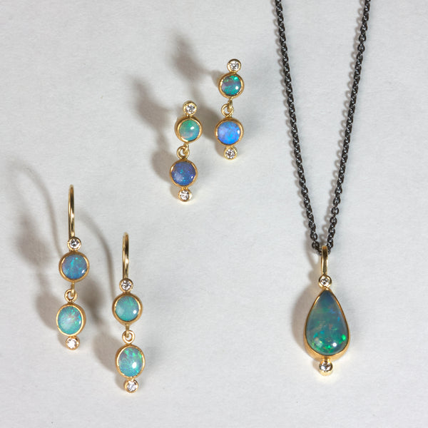 Karin Jacobson Jewelry double opal double diamond earrings with posts in 22k and 18k gold. shown with pear opal and two diamond necklace and double opal double diamond french wire earrings
