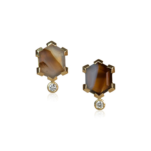 Pair of stud earrings with hexagon-cut Montana agates in shades of brown and gray, each accented by a small round diamond, set in Fairmined 18k yellow gold.