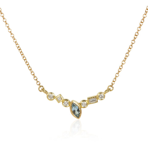 18k gold horizontal necklace with a marquise aquamarine totaling .09 ct and post-consumer recycled diamonds totaling .18 ct, arranged in a scattered Confetti pattern, shown on an 18k gold cable chain.