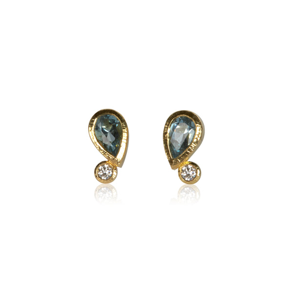 Pair of 18k gold stud earrings with pear-shaped aquamarines totaling .35 ct and post-consumer recycled diamonds totaling .06 ct, arranged as mirrored Confetti designs.
