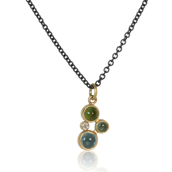handcrafted in minnesota gold necklace with green and blue cabochon stones and recycled diamond