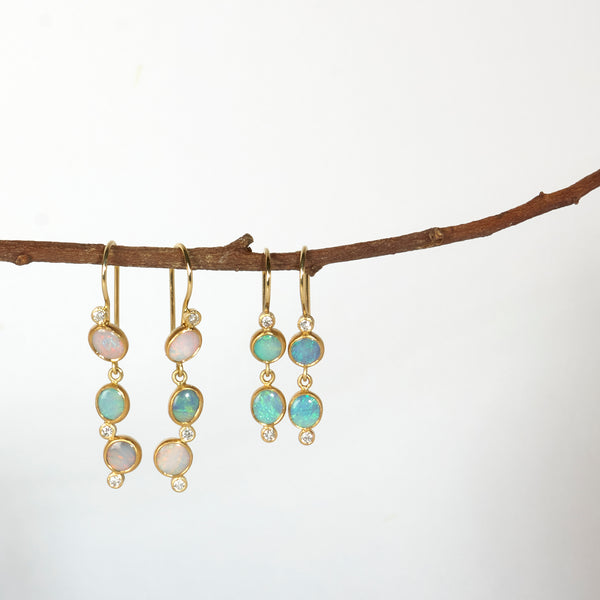 Karin Jacobson Jewelry triple opal & diamond earrings with french wires in 22k and 18k gold. shown with double opal & diamond french wire earrings.