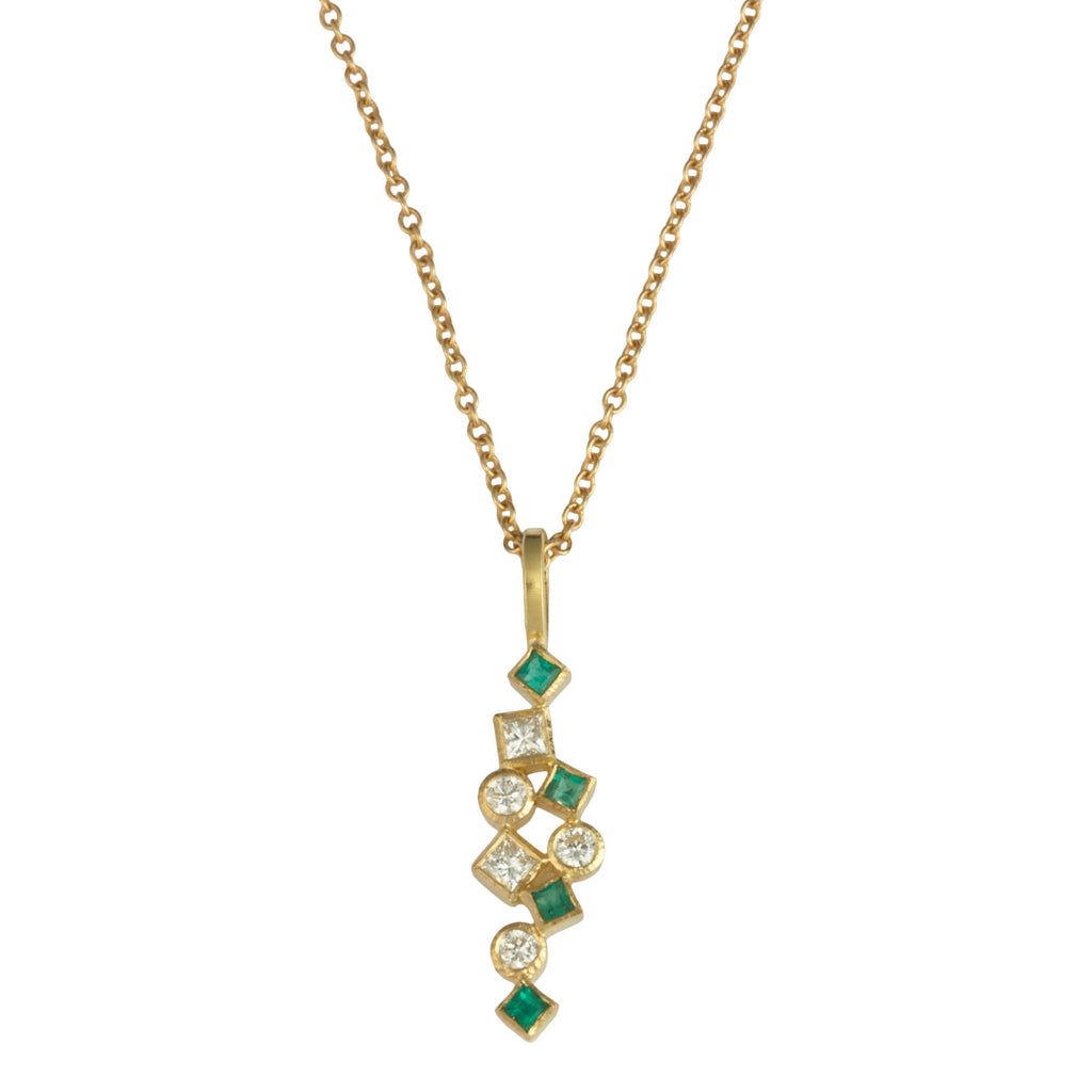 Photo of karin jacobson jewelry design diamond & emerald confetti necklace in 18k yellow gold. The diamonds and emeralds are both post-consumer recycled.