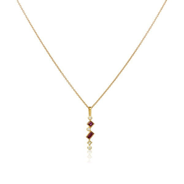 Shows an 18k yellow gold confetti necklace with various square, rectangle and round grape garnets (pinkish red) and diamonds, hanging from a gold cable chain on a white background.