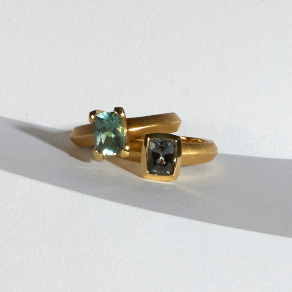 karin jacobson jewelry design malawi light blue cushion cut sapphire solitaire ring with gray spinel bezel set solitaire ring