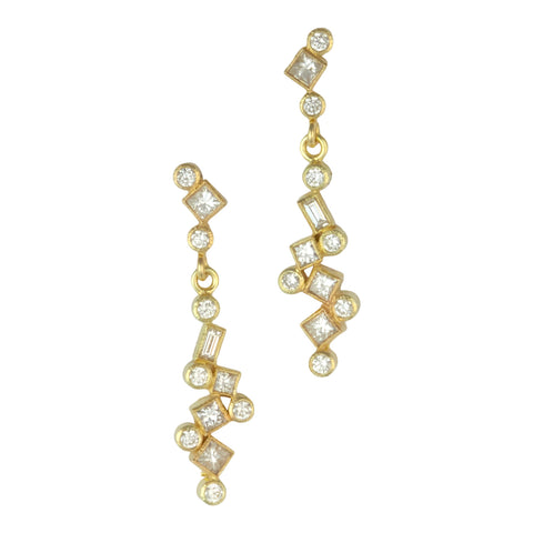 Photo of karin jacobson jewelry design hinged confetti earrings in 18k yellow gold with post consumer recycled diamonds.