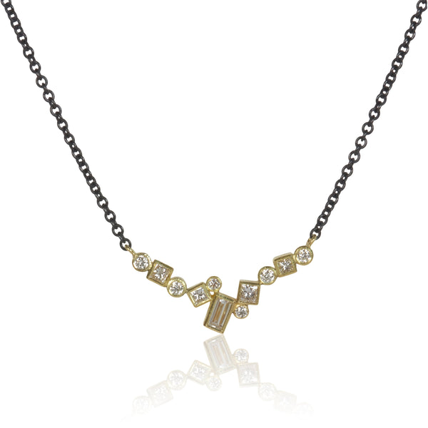 Horizontal 18k gold bar pendant set with scattered post-consumer recycled diamonds, shown on an oxidized sterling silver adjustable cable chain.
