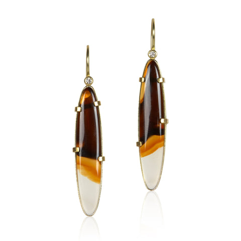 Elongated oval Montana agate earrings in Fairmined 18k yellow gold with diamond accents, featuring sweeping brown, amber, and white bands. fronts