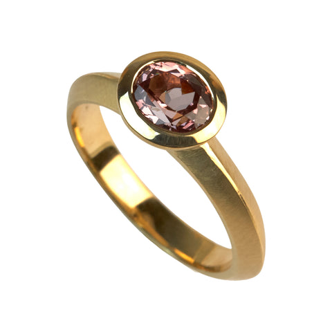 handcrafted 18k gold ring with malaya garnet solitaire gemstone