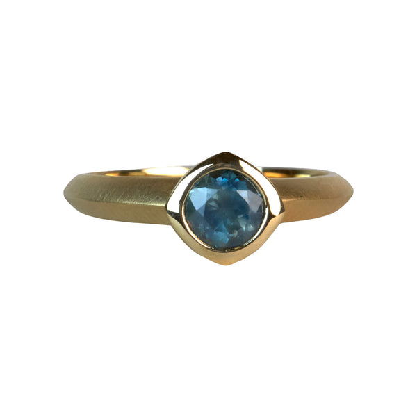karin jacobson jewelry with turquoise sapphire stones and sustainable gold