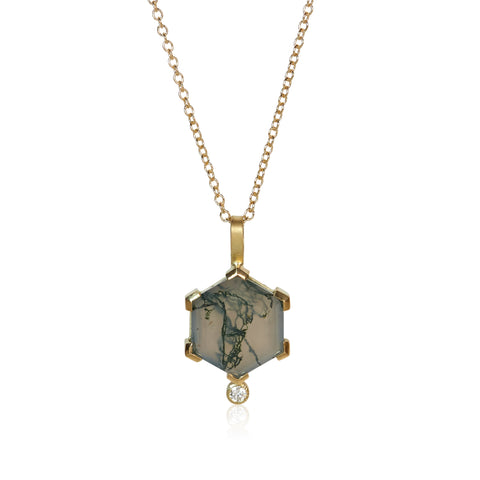 Pendant necklace with a hexagon moss agate showing green inclusions, accented by two small round diamonds, set in Fairmined 18k yellow gold.