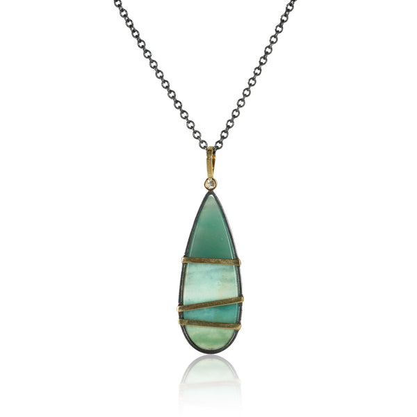 opalized wood pendant on white - back side shown