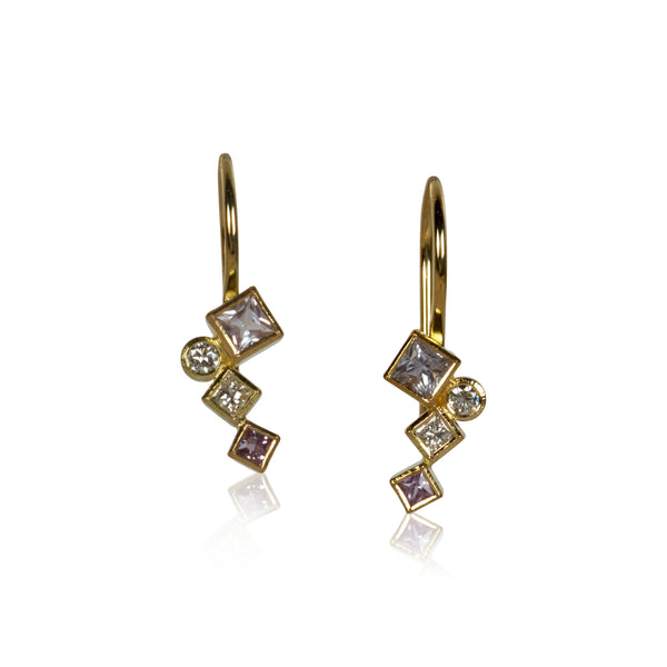Pair of petite 18k gold dangle earrings with pink sapphires totaling .34 ct and post-consumer recycled diamonds totaling .14 ct, arranged in mirrored Confetti patterns and hanging from gold French wires.
