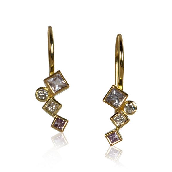 Pair of petite 18k gold dangle earrings with pink sapphires totaling .34 ct and post-consumer recycled diamonds totaling .14 ct, arranged in mirrored Confetti patterns and hanging from gold French wires.
