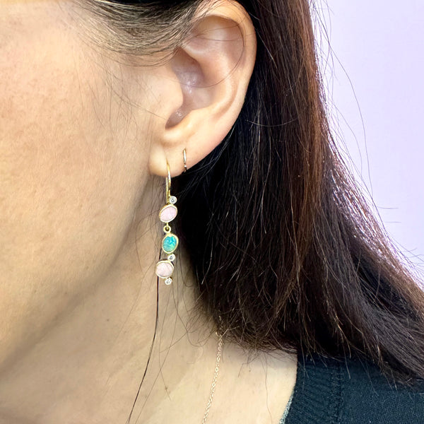 Karin Jacobson Jewelry triple opal & diamond earrings with french wires in 22k and 18k gold. shown on model