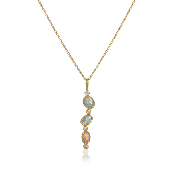 Karin Jacobson jewelry 3 opal and diamond pendant in 18k & 22k gold and sterling silver back, on 18k gold chain. Shown on white.
