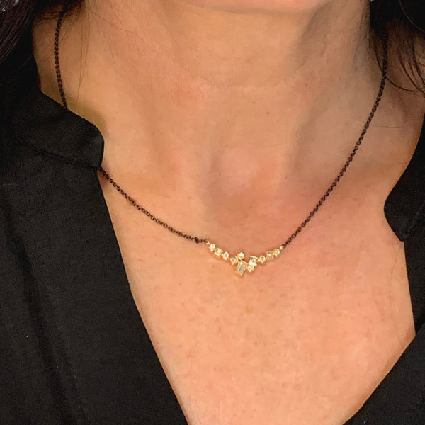 horizontal diamond confetti pendant on oxidized (black) silver chain on model